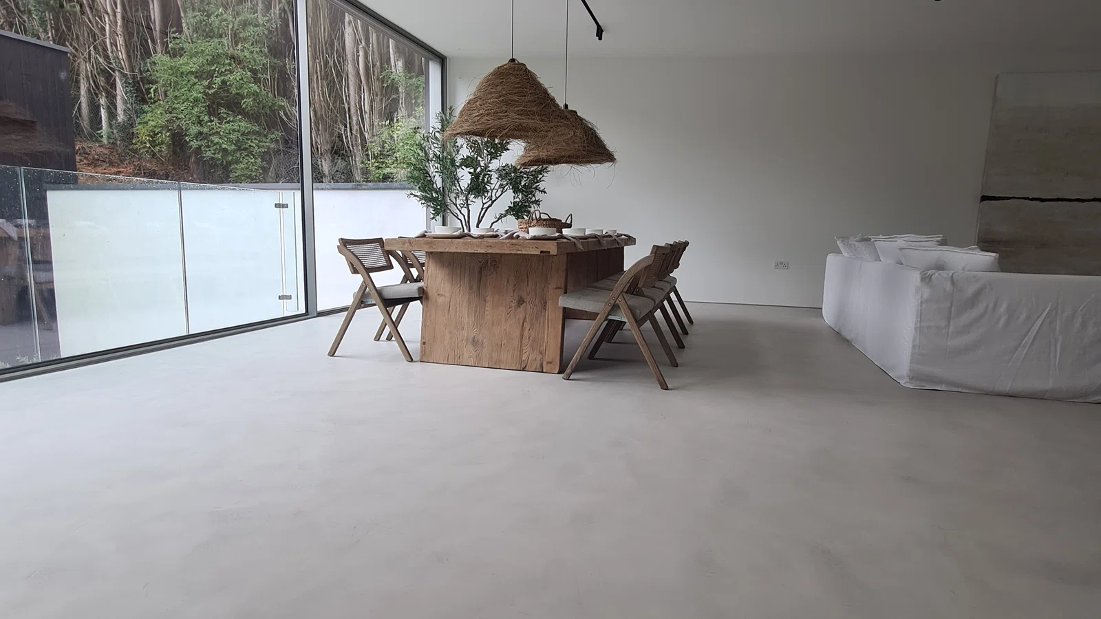 Completed microcement flooring project by Eco Microcement
